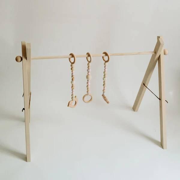 Montessori Young & Wild Co Baby Wooden Play Gym White